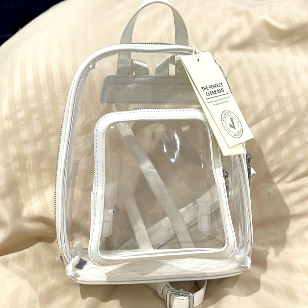 ❤️NEW!!!❤️Clear backpack with white adjustable strap by Madison West.